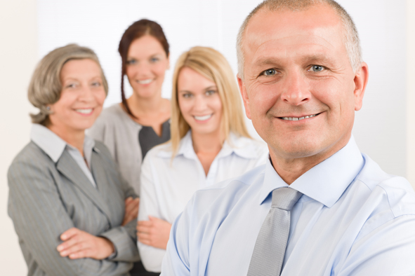 Business team senior manager with happy colleagues