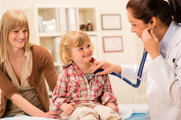 Pediatrician examine child girl with stethoscope
