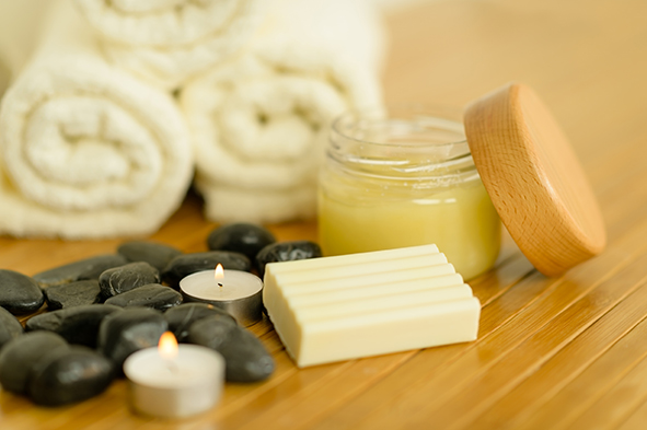 Spa body care products and towels close-up