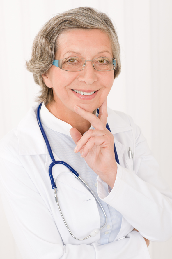 Senior doctor female with stethoscope smiling