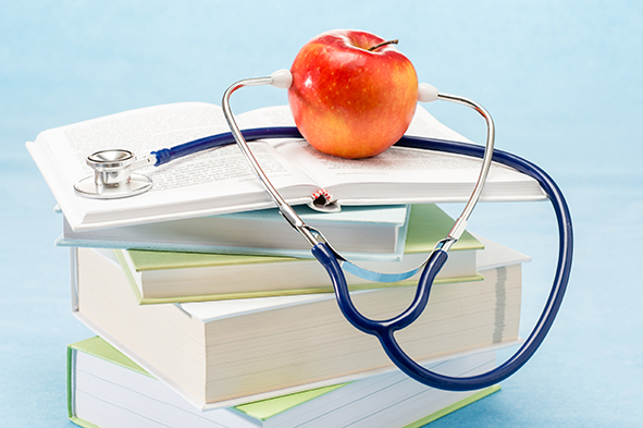 Medical books with stethoscope
